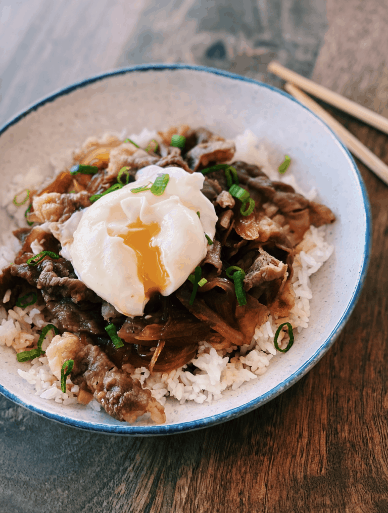 Japan's Favorite Beef Rice Bowl - Gyudon, served with a soft boiled egg