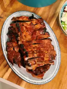 A plate full of sliced Air Fryer BBQ Pork