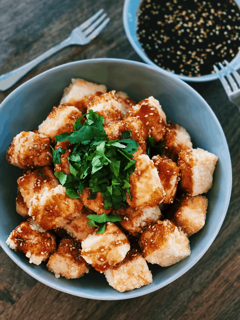 Fried Tofu with Garlic Sauce, golden and crispy, served as a flavorful vegetarian Asian appetizer.