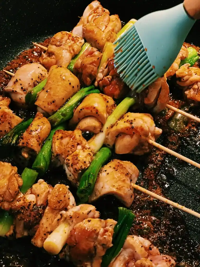 Brushing Sauce on to Yakitori Skewers