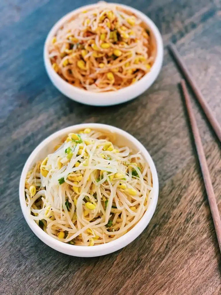 2 different flavors of Korean Bean Sprouts Side Dish served in a dish