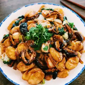 A plate of Shanghai Stir Fried Rice Cakes