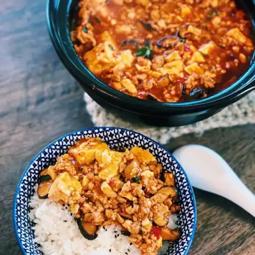 Spicy Mapo Tofu is typically served with rice in family style dinners