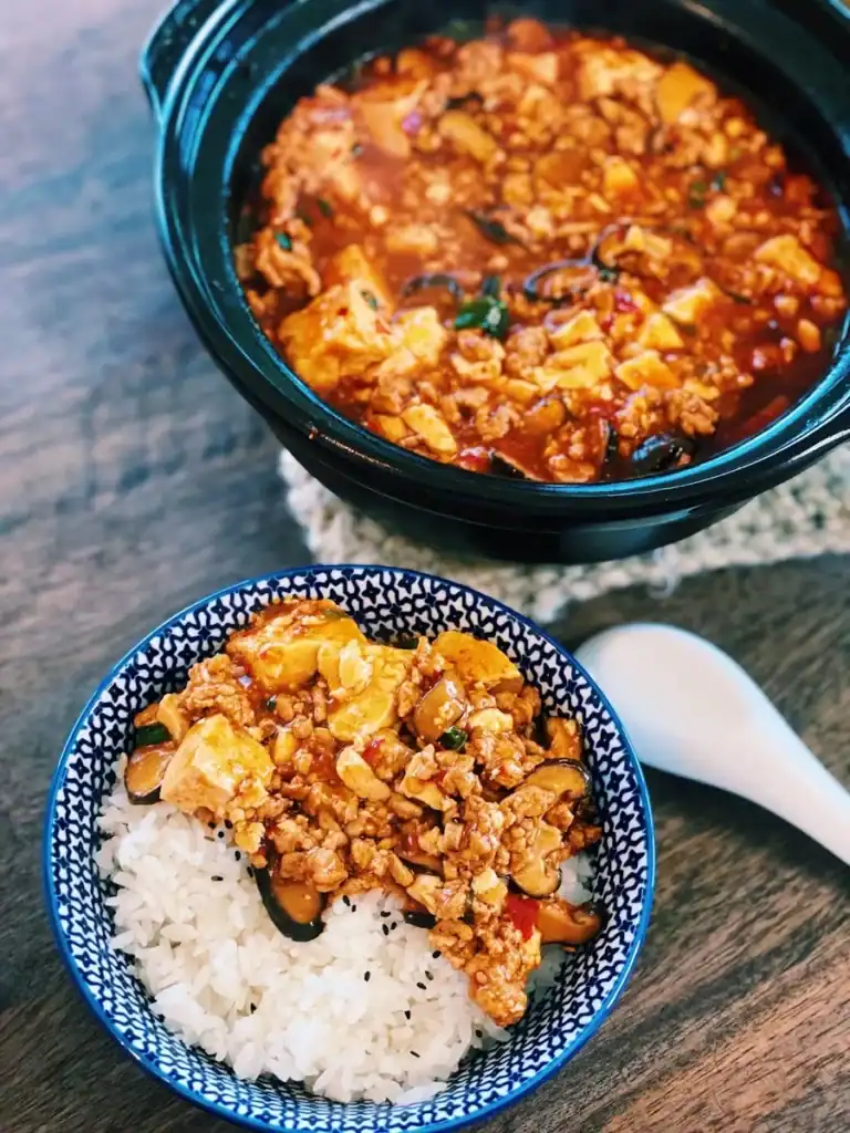 Spicy Mapo Tofu is typically served with rice in family style dinners