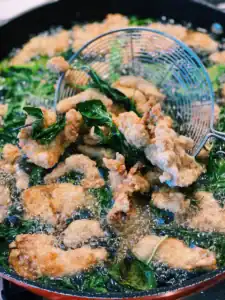 Frying Taiwanese Popcorn Chicken with Basil