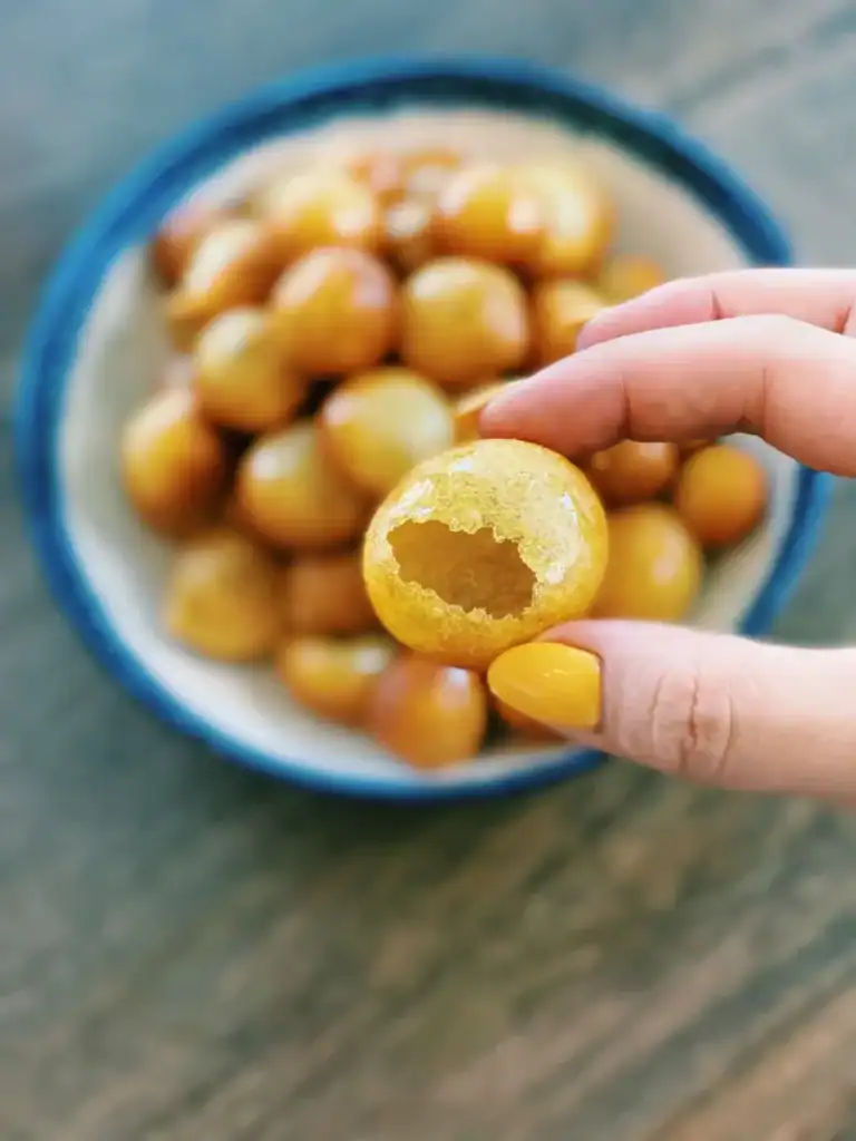 Showing the hollow insides of Deep Fried Taiwanese Sweet Potato Balls 