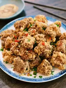 Salt and Pepper Pork Spare Ribs served with extra seasoning salt for dipping