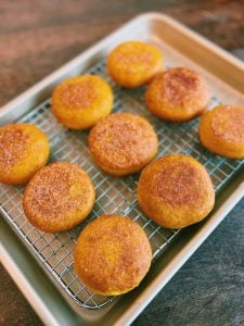 Korean Cheesy Pumpkin Hotteok Freshly Fried and resting on a rack
