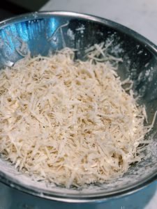 cornstarch dusted potato shred for Crispy Potato Pancakes