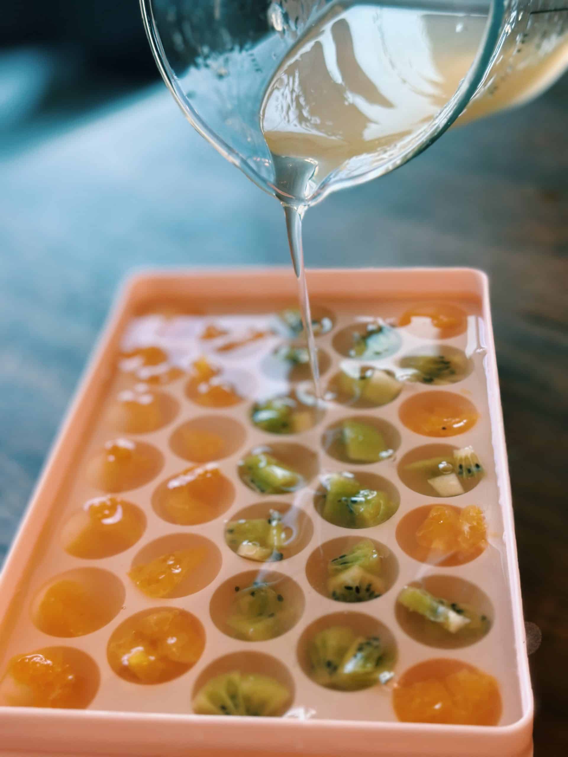 Adding Fruit Jelly mix into the mold