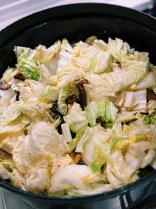 Stir Frying Napa Cabbage and Mushrooms for Taiwanese Braised Cabbage