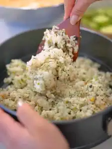Starting off the base with a layer of furikkake rice for Mayo Crab Spicy Salmon Sushi Cake