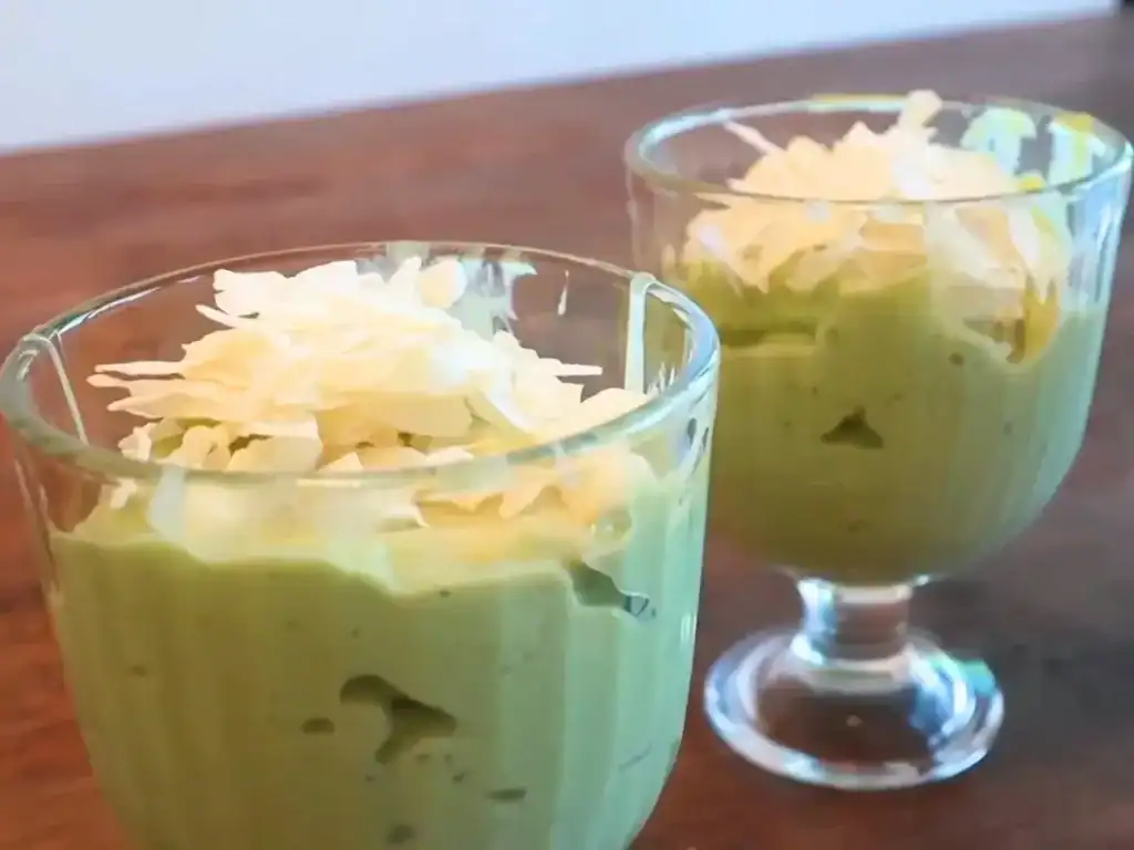 Vietnamese Avocado Smoothie topped with condensed milk and shredded coconut