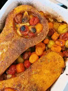 Grilled Butternut squash, tomatoes, and garlic for Dairy-Free Butternut Squash Pasta into the pan