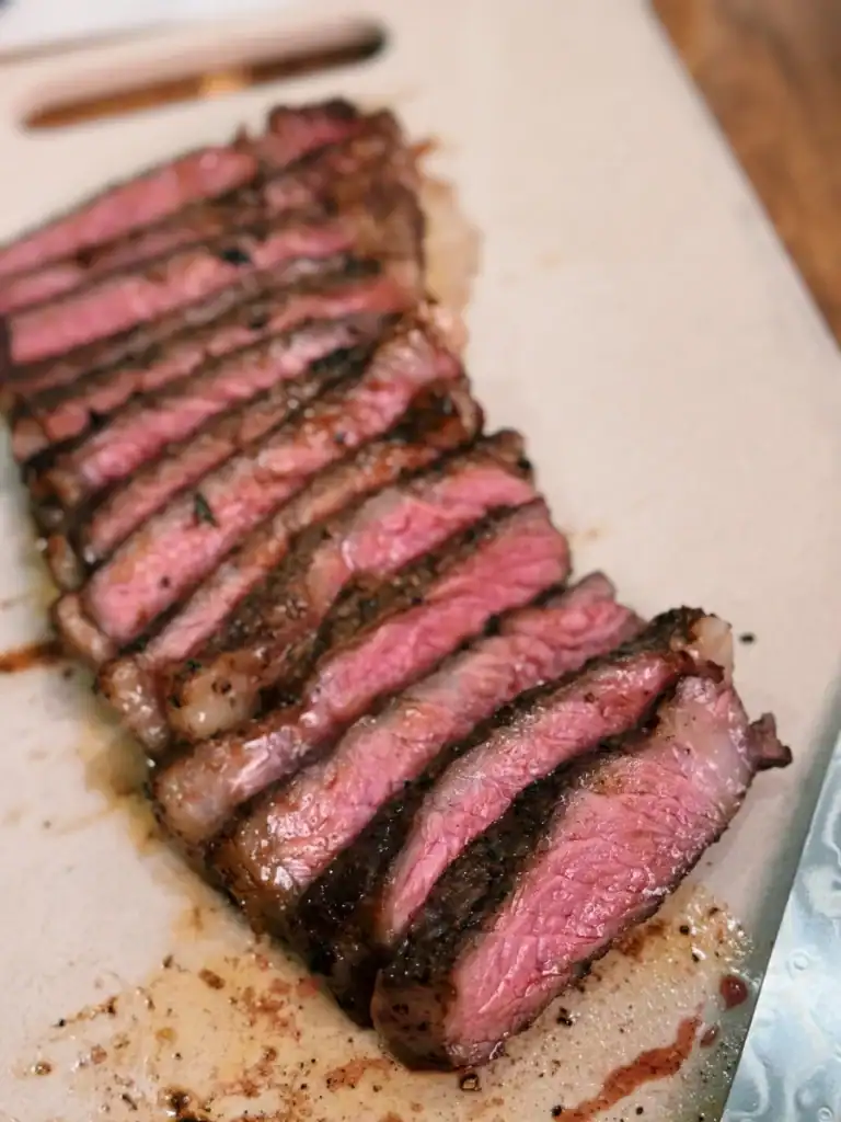 Sliced Reverse Seared steak with gochujang butter