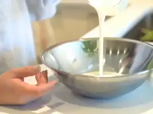 Mixing heavy cream and sugar for homemade whipped cream used for Japanese Fruit Sando