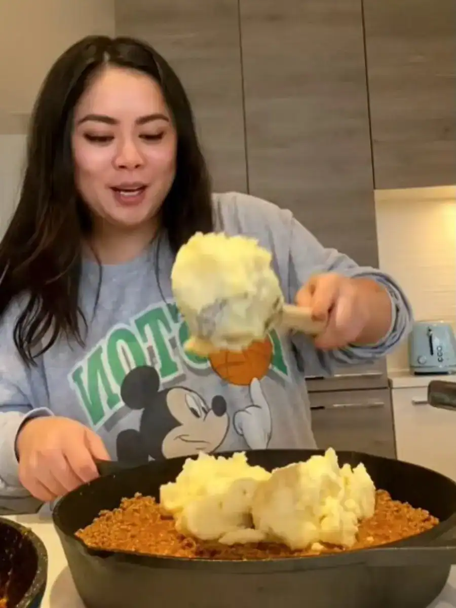 Adding Mashed Potatoes to Easy Cheesy Parmesan Curry Shepherd's Pie