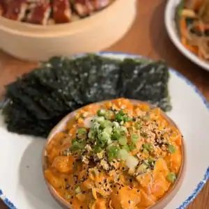 Creamy Salmon Poke Appetizer served with Seaweed