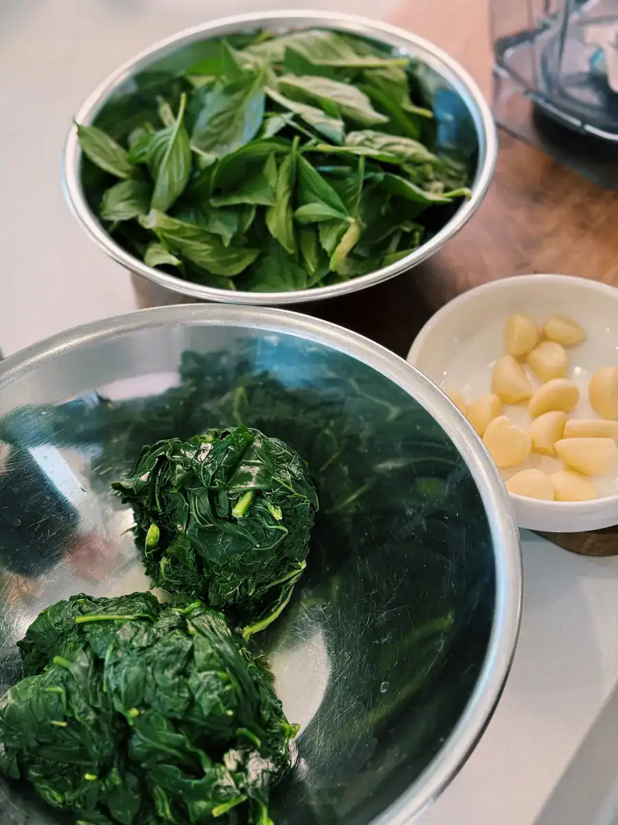 prepared Ingredients for High Protein Pesto including kale, spinach, basil, and garlic