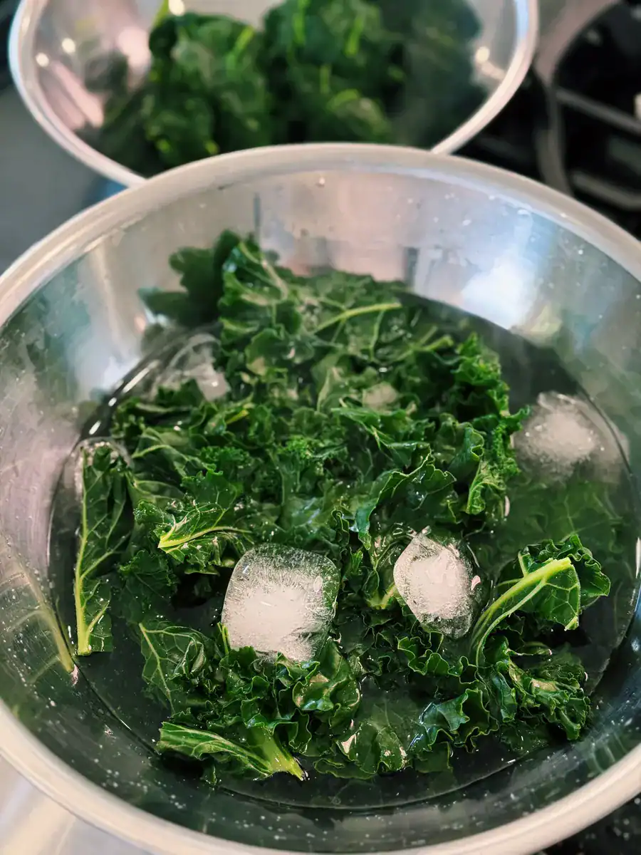 Putting kale and spinach in an ice bath to prevent oxidation for bright green High Protein Pesto