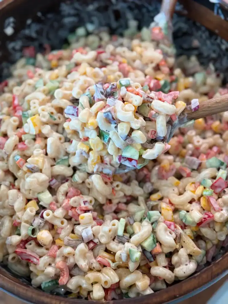 A Scoop of Hawaiian Macaroni Salad made with leftover vegetables from the fridge