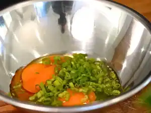 Mixing egg and chopped callions for a 5 minute Taiwanese Scallion Egg Breakfast Wrap