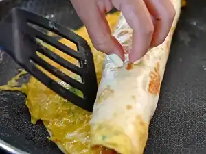 Rolling up a Taiwanese Scallion Egg Breakfast Wrap