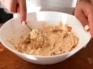 Mixing garlic compound butter for Whole Roast Chicken in the Oven