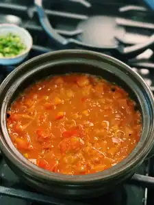 Simmered tomato soup base for 20 minute Tomato Beef Noodle Soup