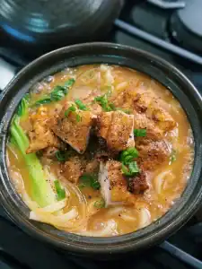 Chicken Curry Udon Soup served with chunks of pan fried curry chicken thighs
