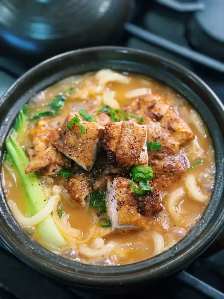 Chicken Curry Udon Soup served with chunks of pan fried curry chicken thighs