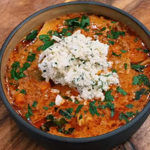 Tomato and Beef Lasagna Soup Topped with Creamy Cheese Topping