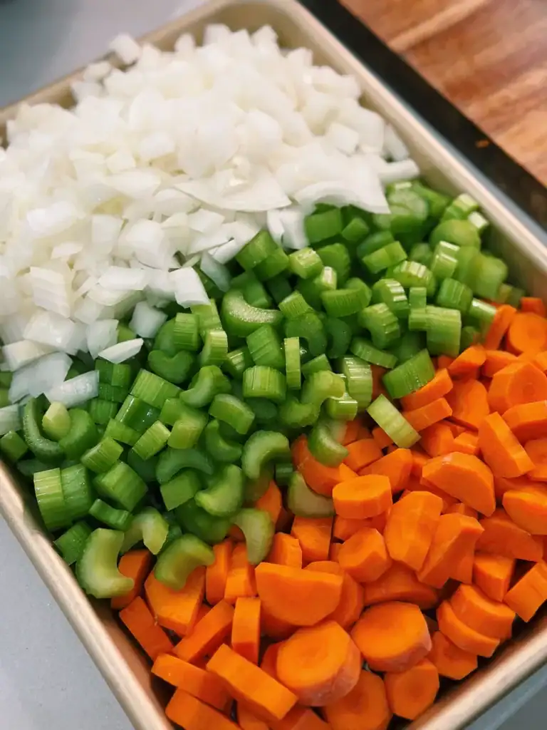 chopped onion, carrots, and celery for Lasagna Soup 