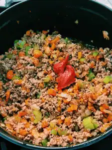 Browning beef with onion, carrots, and celery for Lasagna Soup