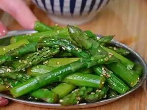 Miso Yuzu Asparagus served in dish.