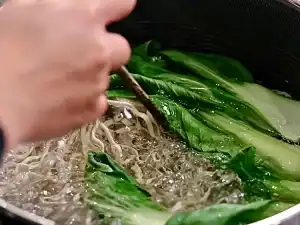 Cooking Noodles and Veggies together for BBQ Pork Lo Mein