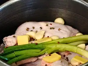 Add Chicken Thighs, Ginger, Scallions, Peppercorn into a pot for braised chicken noodle soup