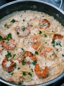 A pan full of Creamy Shrimp Alfredo Pasta