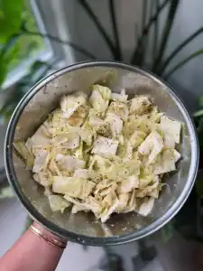 Mixing cabbage and seasoning for Japanese Yamitsuki Cabbage
