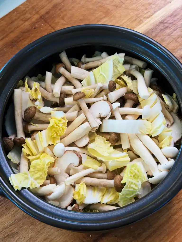 Vegetables like mushrooms and cabbages to add to this Miso Salmon Stew