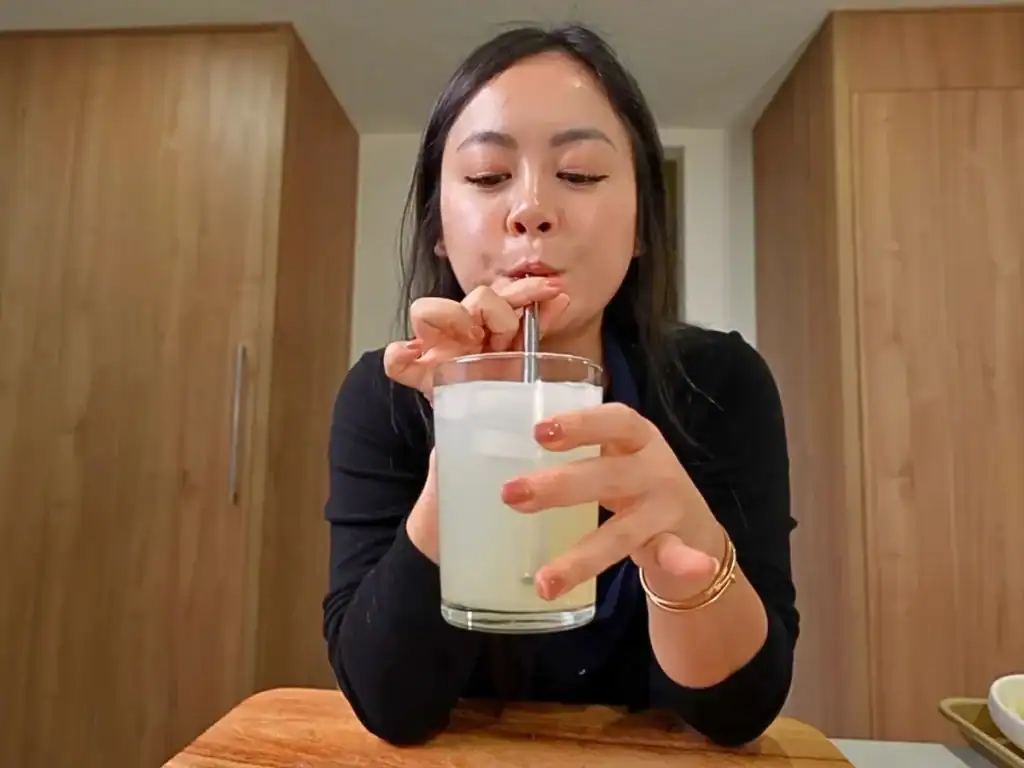 Tiffy taste testing Pineappel Soju Cocktail