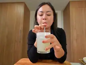 Tiffy taste testing Pineappel Soju Cocktail