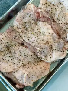 Marinating boneless skin-on Chicken Thigh in salt and pepper