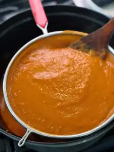 Straining Beef Braising Sauce for Taiwanese Birria Tacos