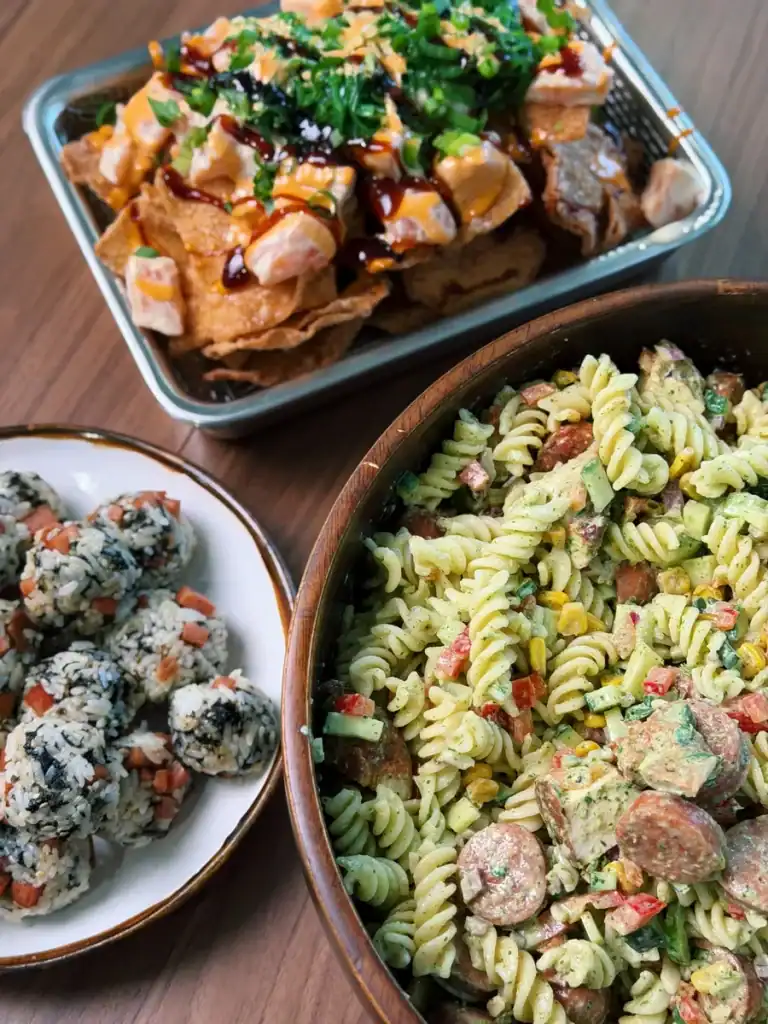 NFL Draft Day Party Spread with Salmon Poke Wonton Nachos, Creamy Chicken Sausage Pasta Salad, and Mini Spam Rice Balls