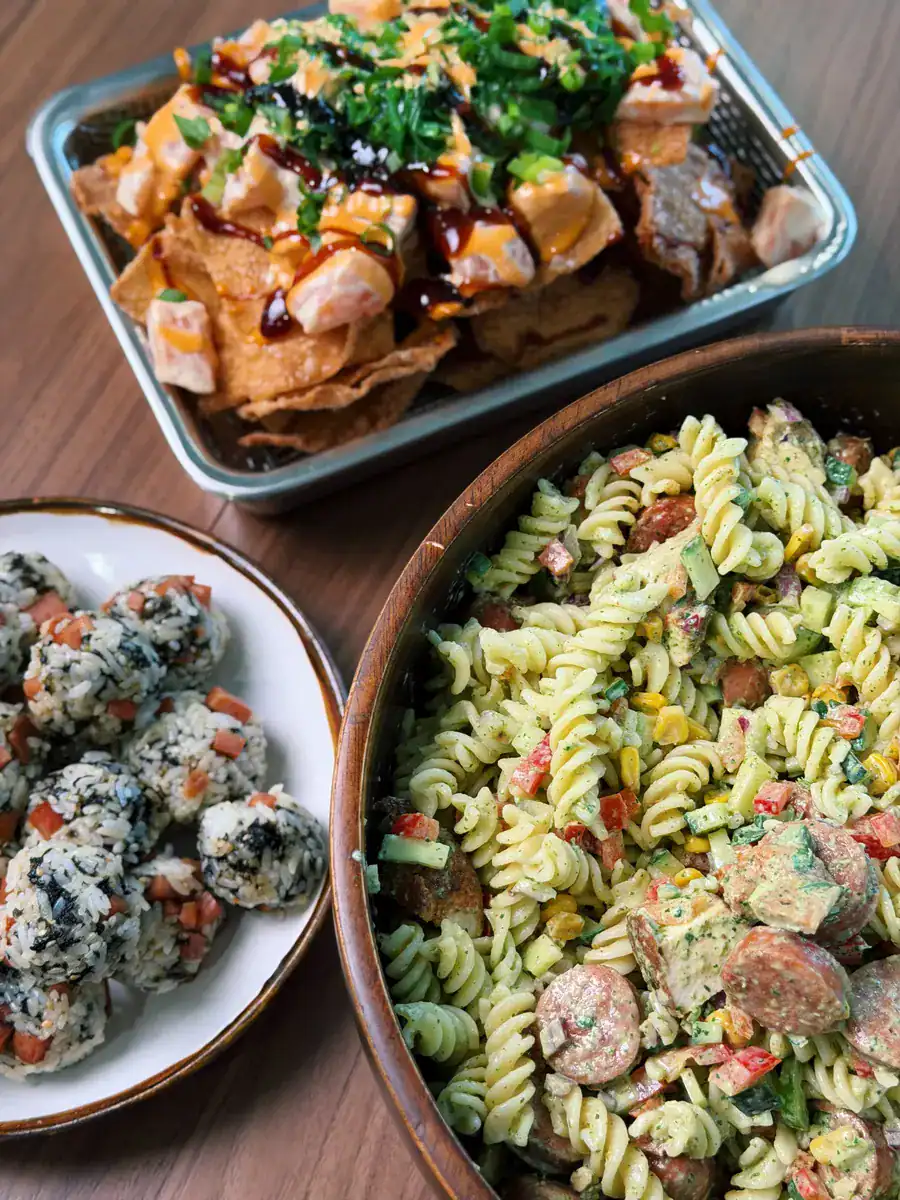 NFL Draft Day Party Spread with Salmon Poke Wonton Nachos, Creamy Chicken Sausage Pasta Salad, and Mini Spam Rice Balls