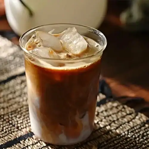 A glass of Maple Sea Salt Latte with ice